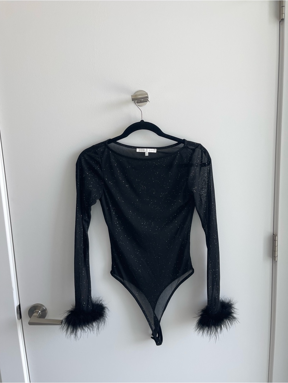 More to Come Black Sparkle Mesh Long Sleeve Bodysuit with Feather Cuffs